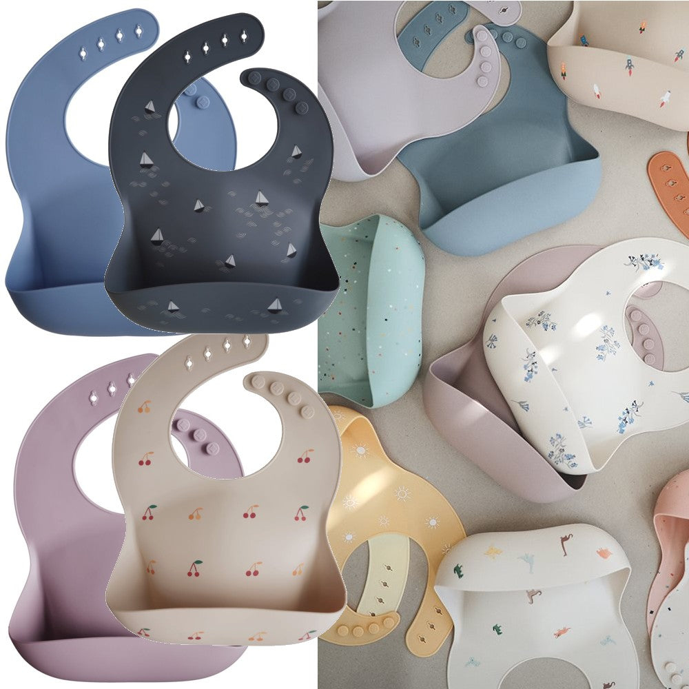Mushie BIB weiches Silikon Auffanglätzchen Sunshine