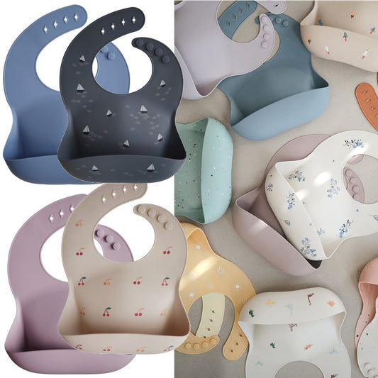 Mushie BIB weiches Silikon Auffanglätzchen Sunshine